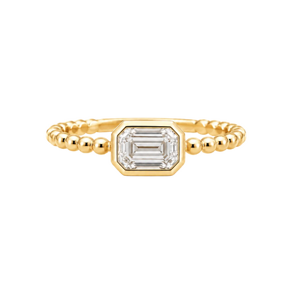 East West Emerald Bezel Ring